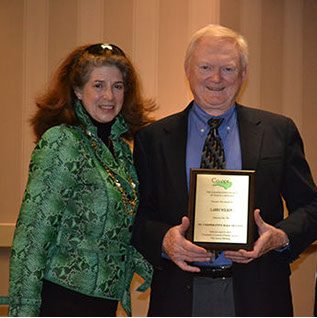 Larry Wilson with his award